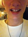 Casual smile.