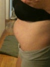 Side view very distended after eating a meal.