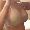 close up of my right breast, the one am concerned about most (photos here are taken with iphone facing me so the left and right and switched, sorry for the confusion). + Photos of breasts in a light version of a sports bra....looks better than naked!