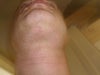 It is hard to see the dent well near adams apple, but it's quite evident in person, people have mentioned it when seen at an angle or underneath!
