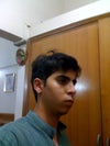 Bulbous looking nose and a small chin evident.