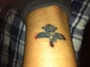 The tattoo with the current damages.