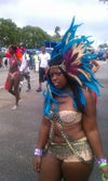 dont mind the feathers it was miami carnival lol as you can see my stomach arms and thighs got to go