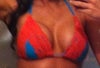 This image was taken in a mirror. the breast on the left is my left breast and it is clearly more round and lacking natural tissue on top.