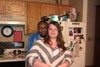 My husband is in back