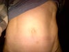 hood over belly button and pulled down look