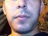 Looking down at camera. Right side seems to have an even curve, left doesn't seem to match.