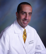 Tom J. Pousti, MD, FACS