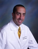 Tom J. Pousti, MD, FACS