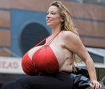 Chelsea Charms large breast implants