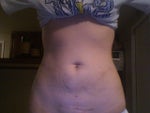See the pooch just below the belly button???