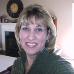 Front view before surgery..wrinkles around eyes..jowls along jaw line.