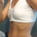 Side view of my 34 A "Before" shot in my post surgery sports bra