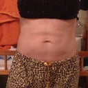 5.5 weeks.  Look at the line (indentation) above the belly button now.