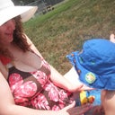 Wearing a "modest" one piece and still a lot of cleavage.