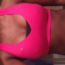 Sports Bra. I wore two, a V cut and straight across one with skinny straps. I thought it was cute and it helped them to not move