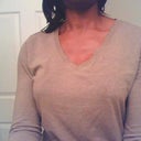 One of my old work shirts with my new breasts - can't tell bc this shirt was big already - 10 days post op