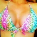 8 weeks out. Unlined, unpadded bikini top. Breasts are getting softer, and incisions have closed. Very pleased :)