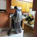 My best friend cooking for me.  My diva cat begging for food as usual.