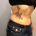 1 year - I'll have to take one of the scar but it's much lighter/faded/