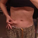 Me pinching fat on the left side of my body.