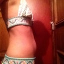 Right side view of my pretty flat breasts. Not so bad for my tummy, I think.
