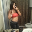An AFTER pic.  Side shot in capris.  My tummy gained a little weight since the black under pic