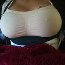 one bigger than the other, lol ~ its not ,,just the way the photo was taken~ umm sorry this pic is upside down ;)