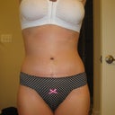 with panties and the line above my panties is just an imprint from my Spanx...its not the scar