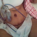 laying down, very swollen