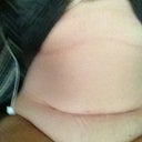 Sitting down. At 133 lbs, I shouldn't have a stomach that looks like this...
