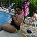 My 31 st birthday hanging poolside in a bikini but still have tank top over to hold up girls....