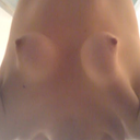 Bending over before. This one really highlights the amount of looseness my breasts had. Definitely didn't make me feel sexy being topless around anyone