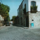 The streets in  San Miguel de Allende are all cobble stone, and the buildings are all painted beautiful southwest colors of golds, brick red, blue, yellows.