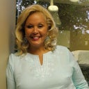In the Dtr's office in front of the window.