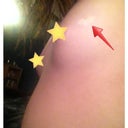 Left side . And my little tanning sticker heart .