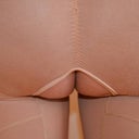 Butt oozing out of my garment due to garment being to small for my enormous 1400 CC per side