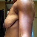 Note the muscle tone. I am flexing something fierce here, and, of course, it makes no difference in how the boob hangs.