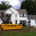 The addition (our master suite) is getting closer and closer to completion.  It looks finished on the outside, at least!  *Please disregard the big yellow dumpster in front*