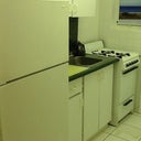 Kitchen with full fridge oven n stove top also comes with microwave and toaster @ Best Western