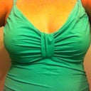 this one is really cute, has a ruffle at the bottom, i love it but before i couldn't do anything but stand up straight in it.  Anything else and it gapped cause the cup was so big that you got to see everything.  Now it fits well.