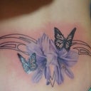 The outline of it..a lily flower and two butterflies (one to represent each of my two boys) This was drawn by my sis who gave to the tattoo artist!