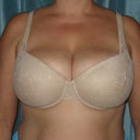 34DDD cup size. Big enough for me to wear as a skull cap.lol