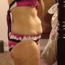 from the side in bathing suit