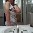 Flexing...  I had a lot of fat hanging over my elbows.