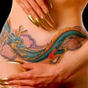 One of my online friends (I play mmorpgs) found this tattoo and though it is huge it would be a neat idea. don't know if I could go thru that tho! but, I love dragons.