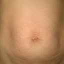 Creepy belly button. The twins completely pushed it out!