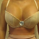 Picture of the girls!  This is a 36D and I completely fill it out (and they haven't even completely dropped yet though they have dropped a lot).  I've always measured a 34 band width (except during and after pregnancy which is why I have this bra) so I'm thinking I'll need a 34DD.  Holy hooters!  I LOVE them!!!