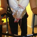 front view of me leaning on my walker