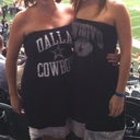 Post op 11 days football game. I am on the left. Bandeau bra (no padding, yea!) girls kind of squished down with it and the dress but you get the idea of how modest they are.. Left one still needs to drop so e. :)